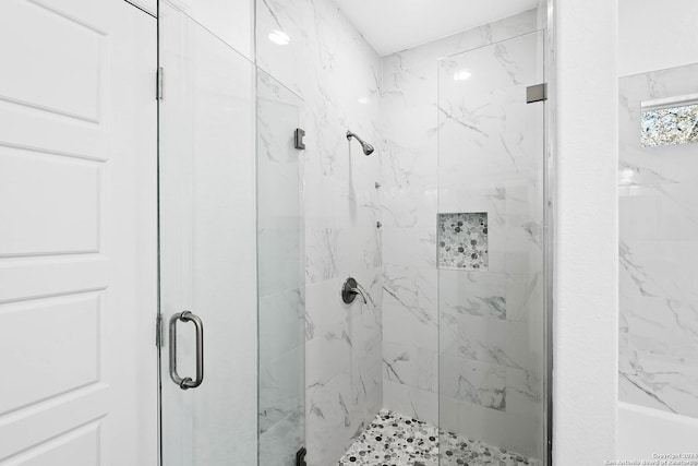 1153 Singing Hills Dr, Canyon Lake, TX 78133 - full bath with a marble finish shower