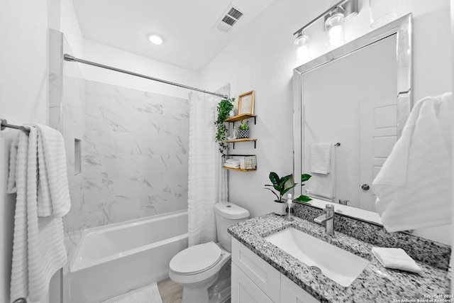 full bathroom featuring vanity, toilet, and shower / bath combo with shower curtain