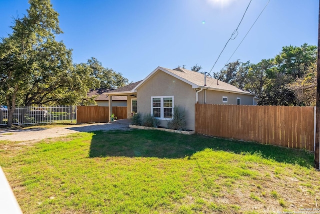 1153 Singing Hills Dr, Canyon Lake, TX 78133 - view of front of property with stucco siding
