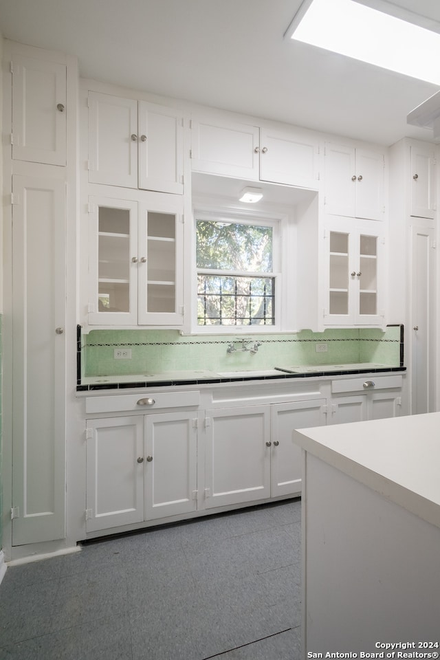 kitchen with white cabinetry