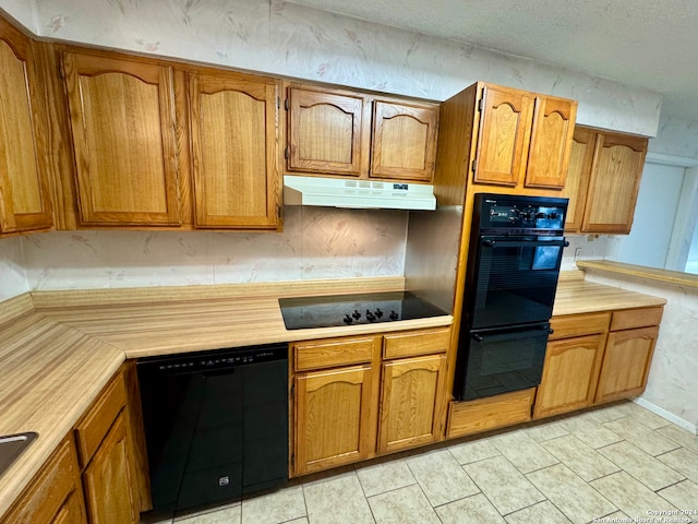 kitchen with black appliances