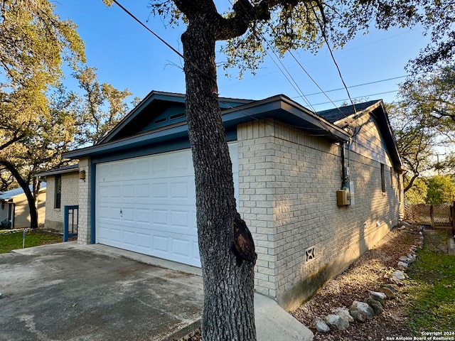 view of home's exterior featuring a garage