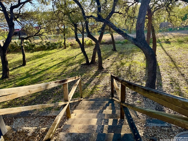 surrounding community featuring a lawn