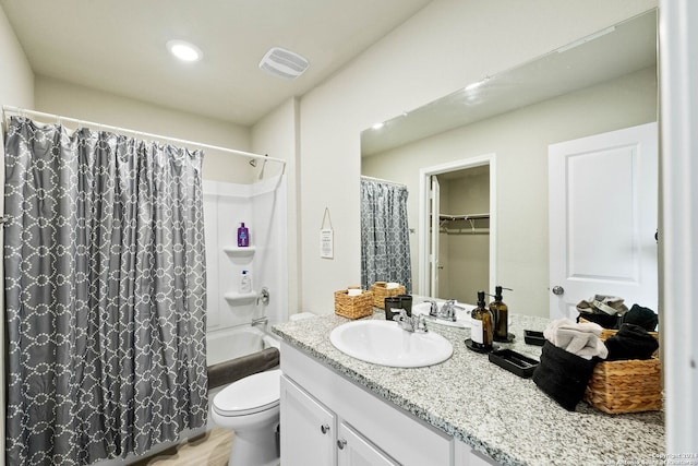 full bathroom with hardwood / wood-style flooring, shower / bath combination with curtain, toilet, and vanity