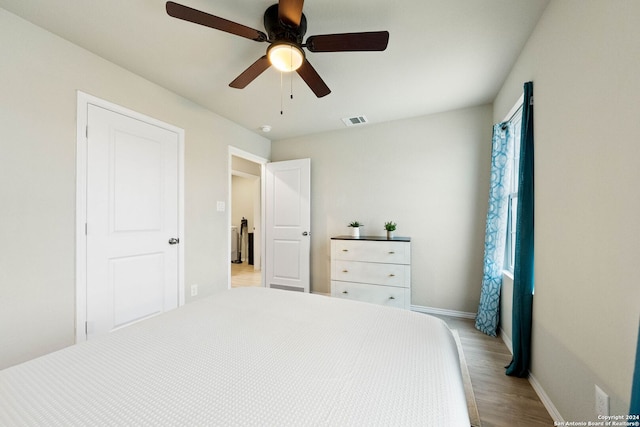 bedroom featuring ceiling fan and light wood-type flooring