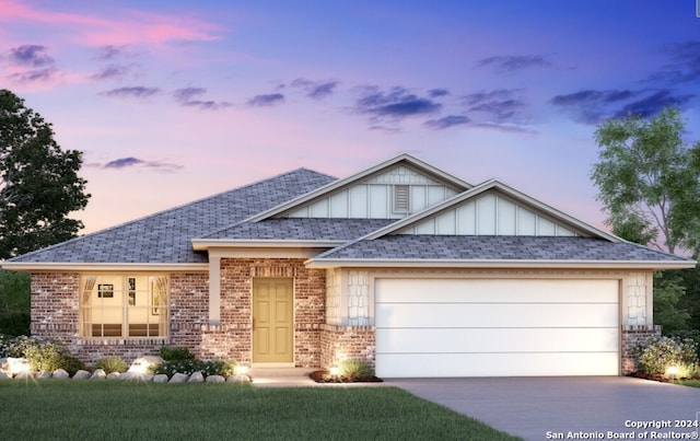 view of front of home featuring a garage, driveway, brick siding, and board and batten siding