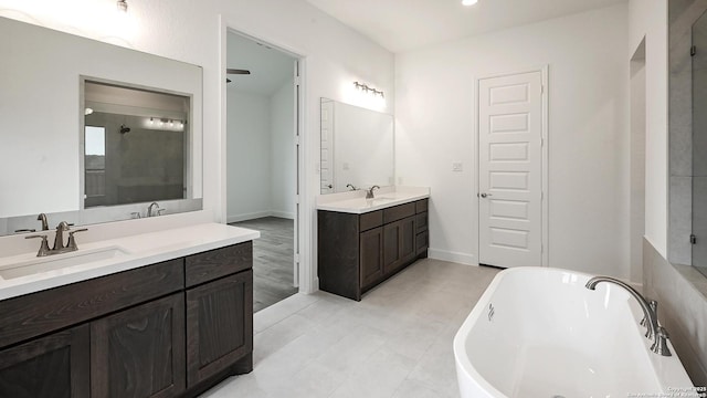 bathroom with vanity and plus walk in shower