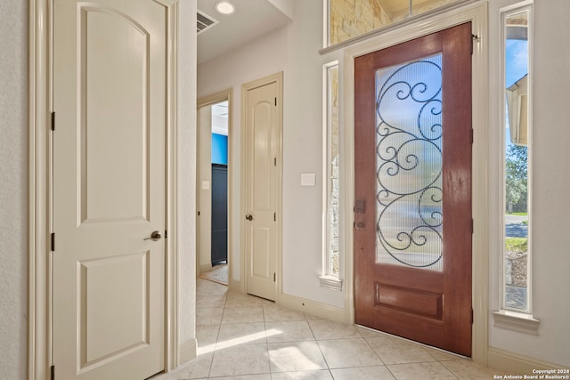 foyer with light tile patterned floors