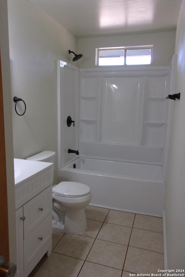 608 Val Verde Dr, Pleasanton, TX 78064 - full bathroom featuring tile patterned floors, vanity, tub / shower combination, and toilet