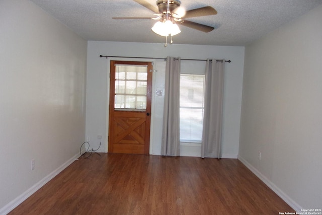608 Val Verde Dr, Pleasanton, TX 78064 - unfurnished room featuring wood finished floors, a ceiling fan, a textured ceiling, and baseboards
