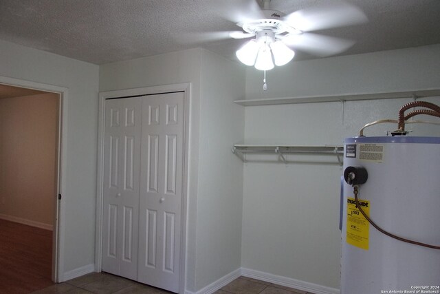 608 Val Verde Dr, Pleasanton, TX 78064 - utility room with gas water heater