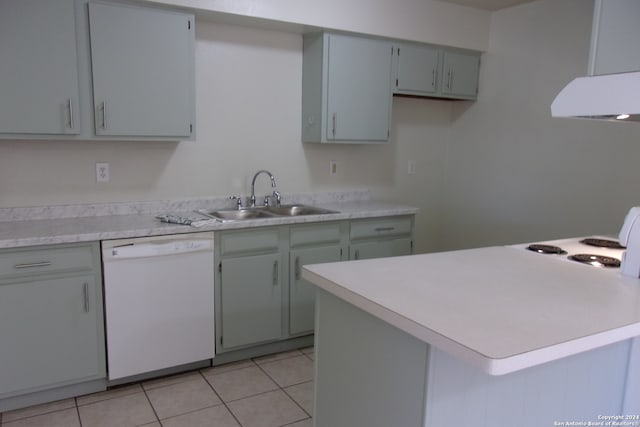 kitchen with gray cabinetry, sink, kitchen peninsula, white dishwasher, and light tile patterned floors