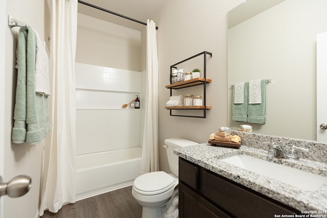 full bathroom featuring shower / bath combo, toilet, wood-type flooring, and vanity