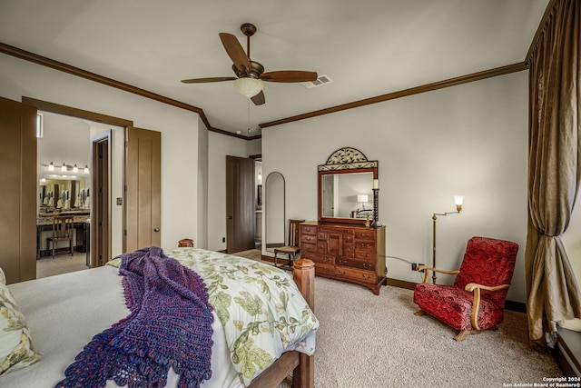 bedroom featuring ornamental molding, ensuite bathroom, ceiling fan, and light colored carpet