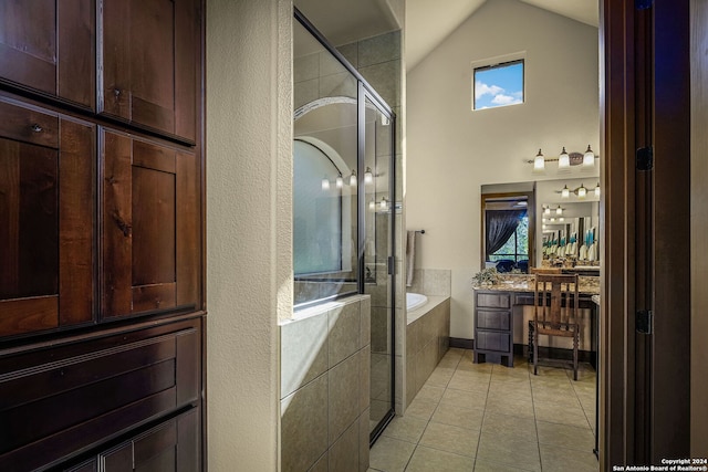 bathroom with tile patterned floors, plenty of natural light, lofted ceiling, and shower with separate bathtub