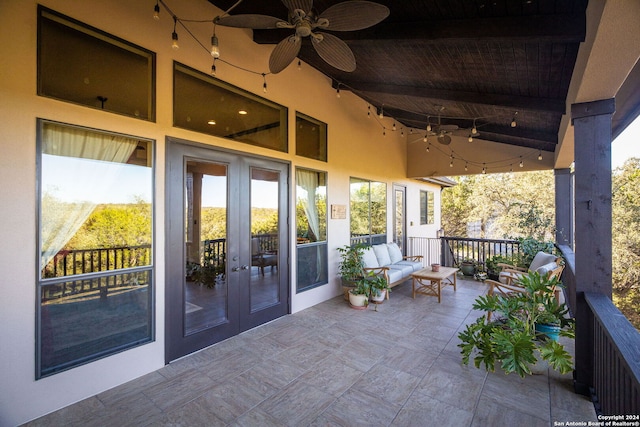 view of patio / terrace with french doors, an outdoor living space, and ceiling fan