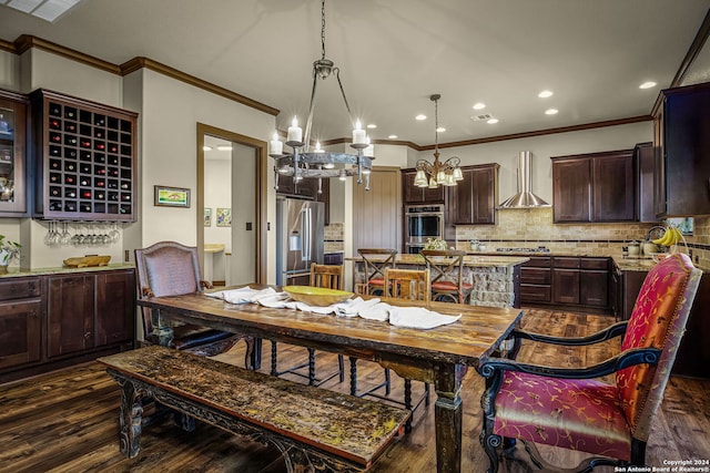 dining space with ornamental molding, dark hardwood / wood-style floors, and a notable chandelier