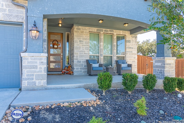 property entrance with a porch