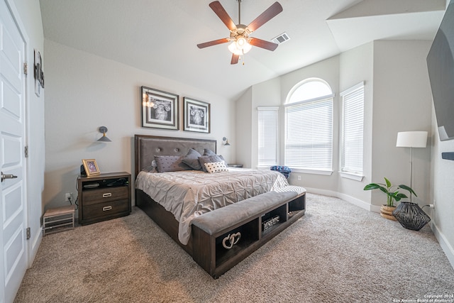 carpeted bedroom featuring ceiling fan and lofted ceiling