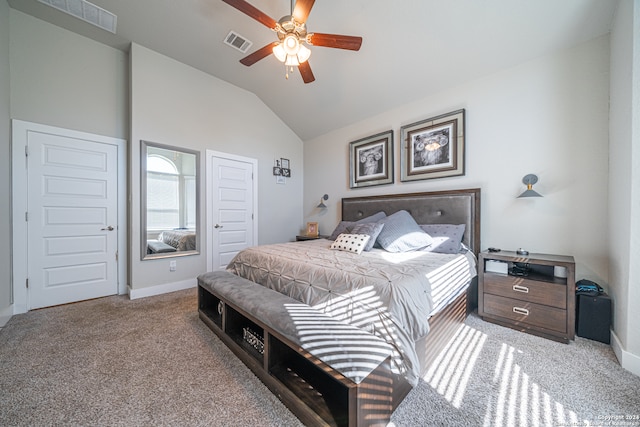 carpeted bedroom featuring ceiling fan and lofted ceiling