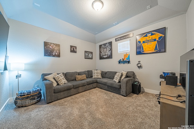 carpeted living room featuring lofted ceiling and a textured ceiling