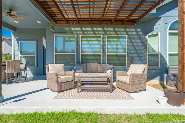 view of patio featuring an outdoor hangout area, ceiling fan, and a pergola