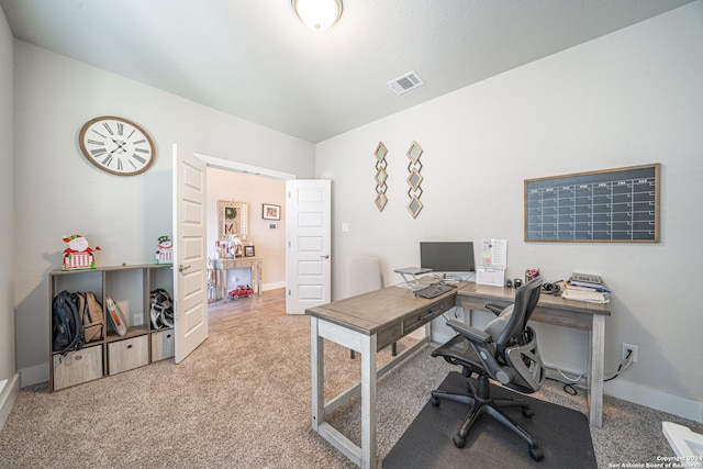 home office with light carpet