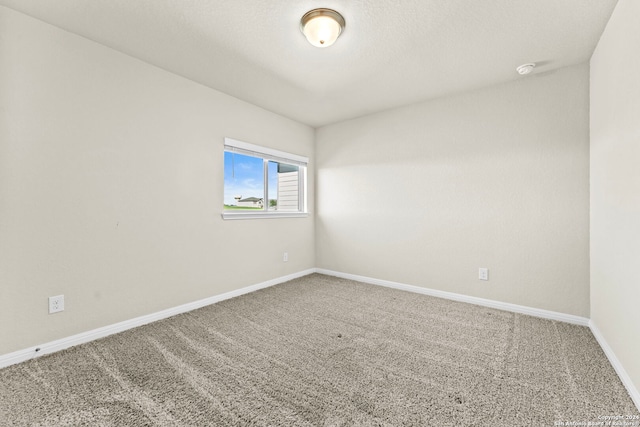 empty room with carpet floors