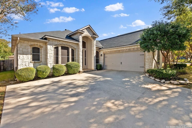 single story home featuring a garage