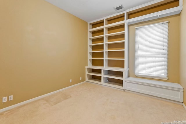 unfurnished bedroom featuring carpet