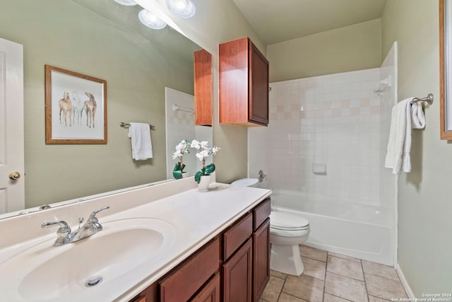 full bathroom with tile patterned floors, vanity, toilet, and tiled shower / bath