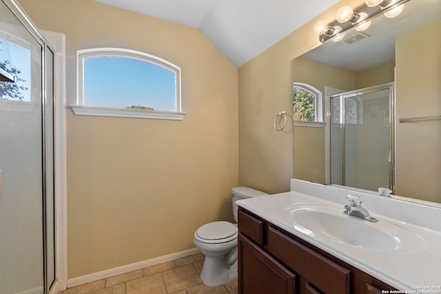 bathroom featuring tile patterned floors, vanity, lofted ceiling, toilet, and a shower with shower door