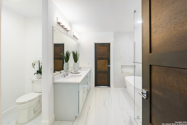 bathroom with vanity, toilet, and a bathing tub