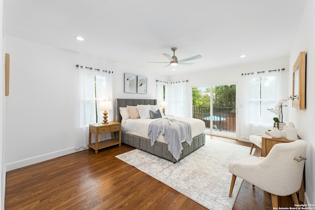 bedroom with access to exterior, ceiling fan, and dark hardwood / wood-style flooring