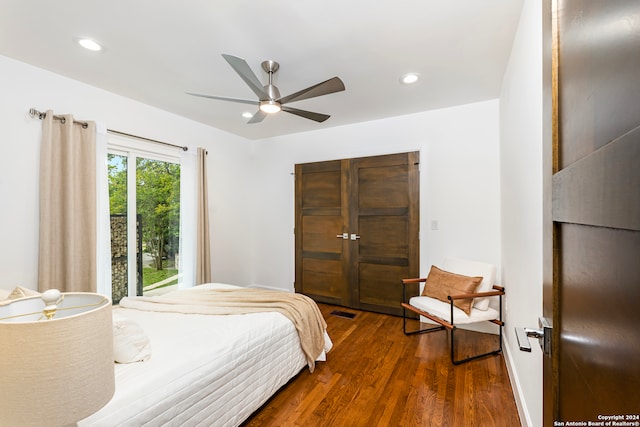 bedroom featuring dark hardwood / wood-style floors and ceiling fan