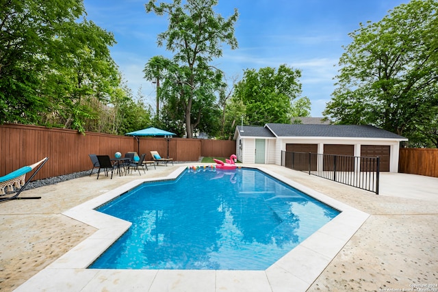 view of swimming pool featuring a patio area