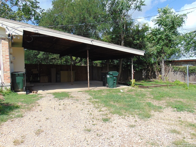 view of yard with a carport