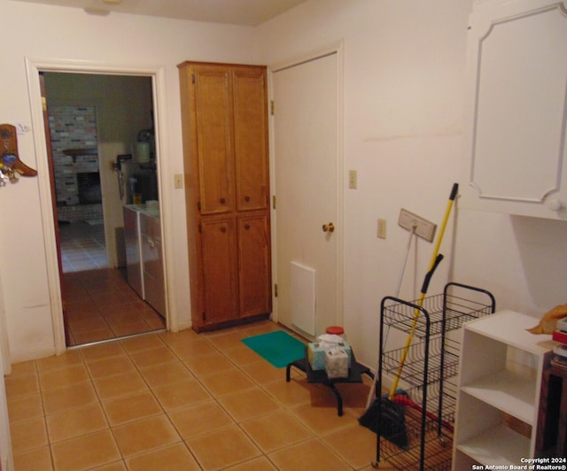 miscellaneous room featuring light tile patterned floors