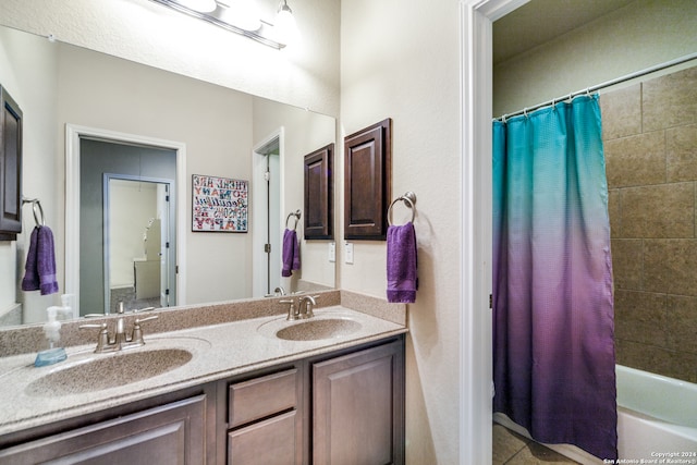 bathroom with vanity and shower / bath combo with shower curtain