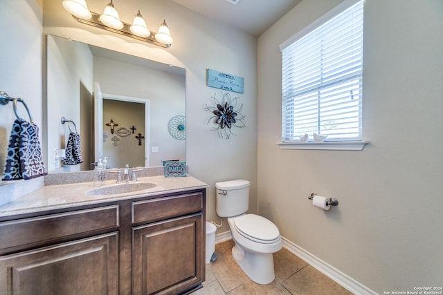 316 English Oaks Cir, Boerne, TX 78006 - half bath with toilet, vanity, tile patterned floors, and baseboards