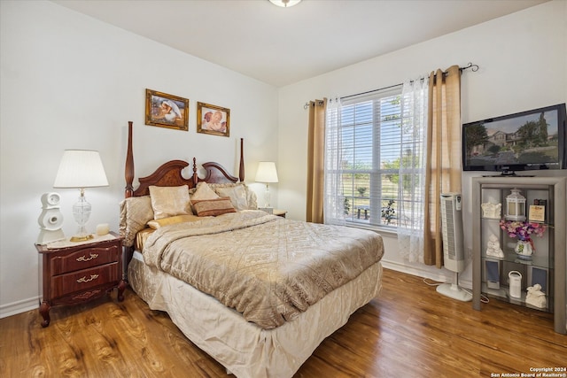 bedroom featuring hardwood / wood-style floors