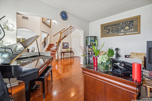 miscellaneous room with hardwood / wood-style floors