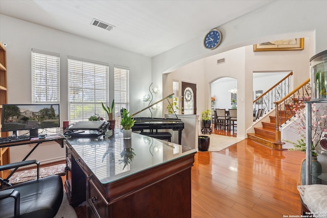 office space with light hardwood / wood-style floors