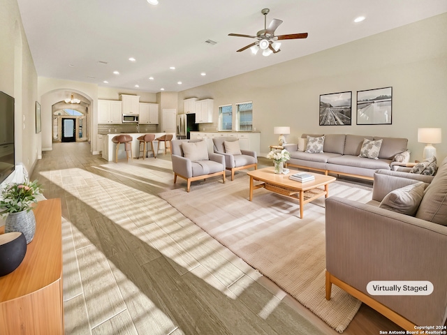 living room with ceiling fan