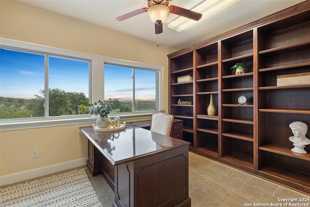 office featuring ceiling fan and light tile patterned floors