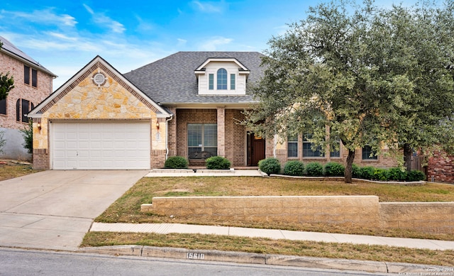 view of front of property featuring a garage