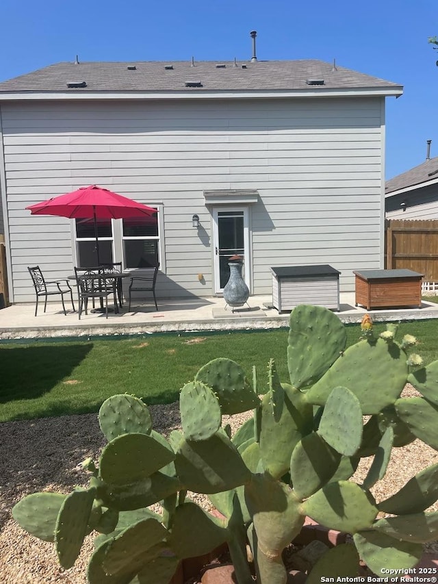 back of house featuring a patio