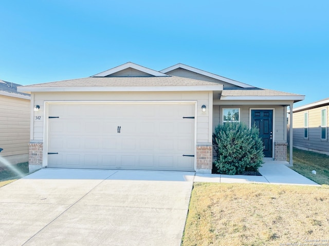 ranch-style home featuring a garage