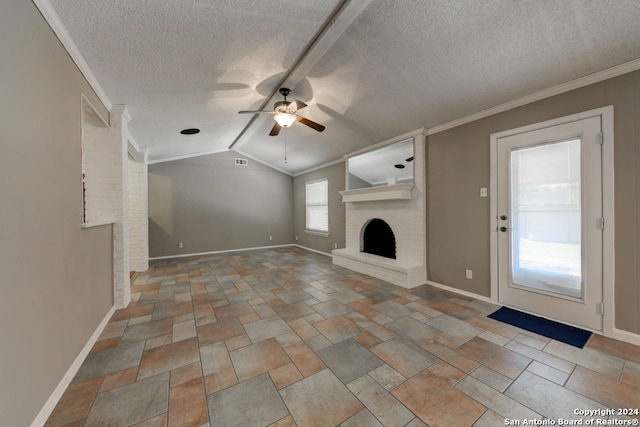 unfurnished living room featuring ceiling fan, plenty of natural light, lofted ceiling, and ornamental molding