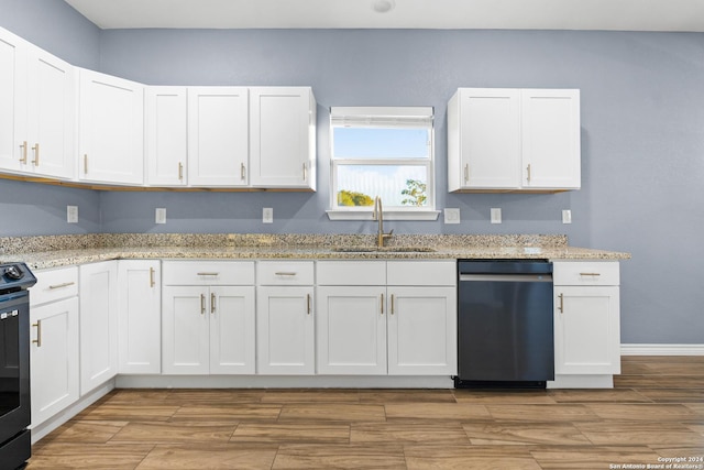 5882 Castle Run, San Antonio, TX 78218 - kitchen featuring dishwasher, a sink, white cabinets, and wood finished floors